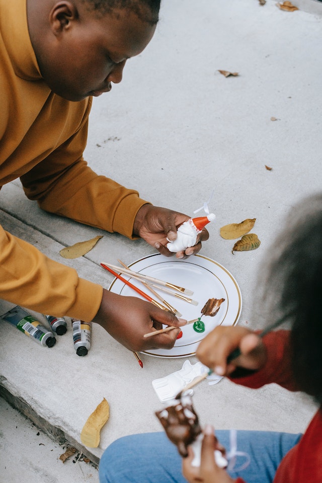 Child making DIY gift for mom on Mother's Day